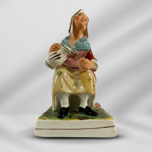 Vintage Hand Painted Porcelain Sitting Woman With Pitcher And Glass